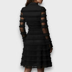 Parisa – Vestido midi con flecos transparentes