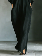 Alessandra • Vestido largo negro oversize minimalista con mangas kimono